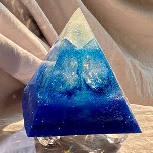 This is a beautiful light up resin pyramid made by me in my studio.